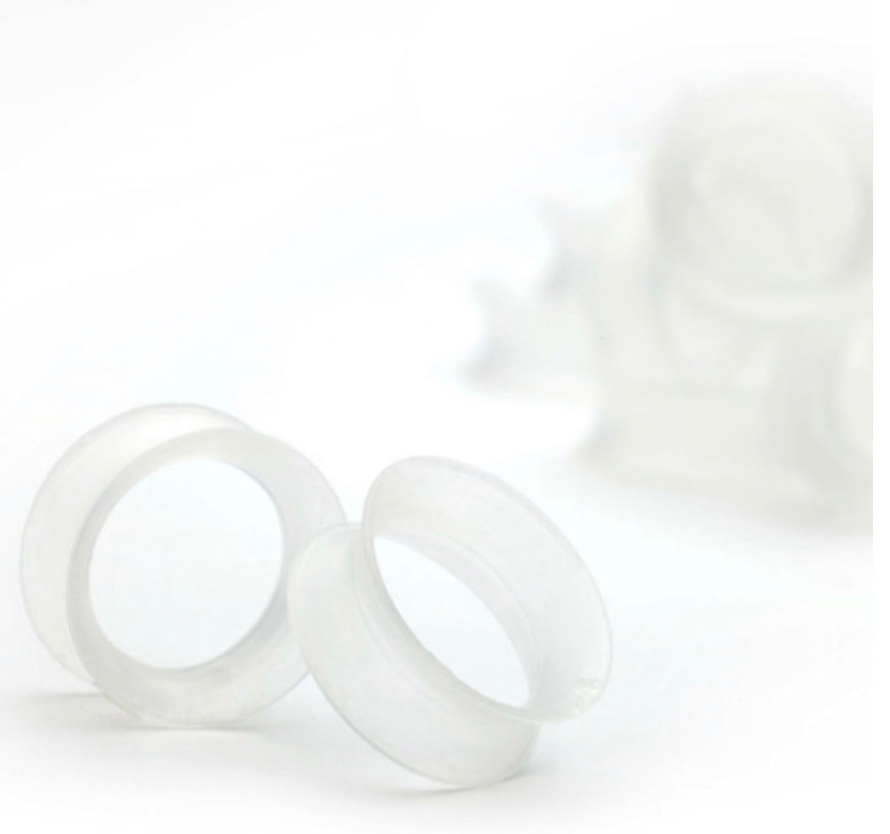 KAOS SOFTWEAR - BASIC SKIN EYELETS (10G THRROUGH 1") - CLEAR - SILICONE - EYELETS